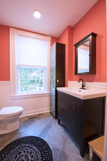 An existing bath room near the offices was reshaped and remodeled.