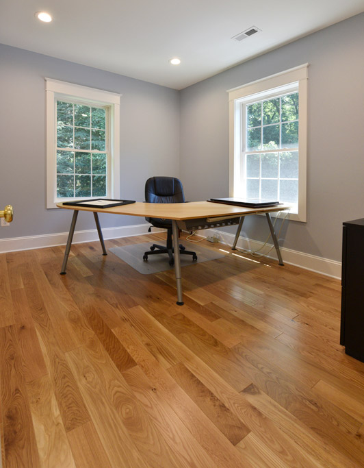 The second office with hardwood floors and ample natural light.