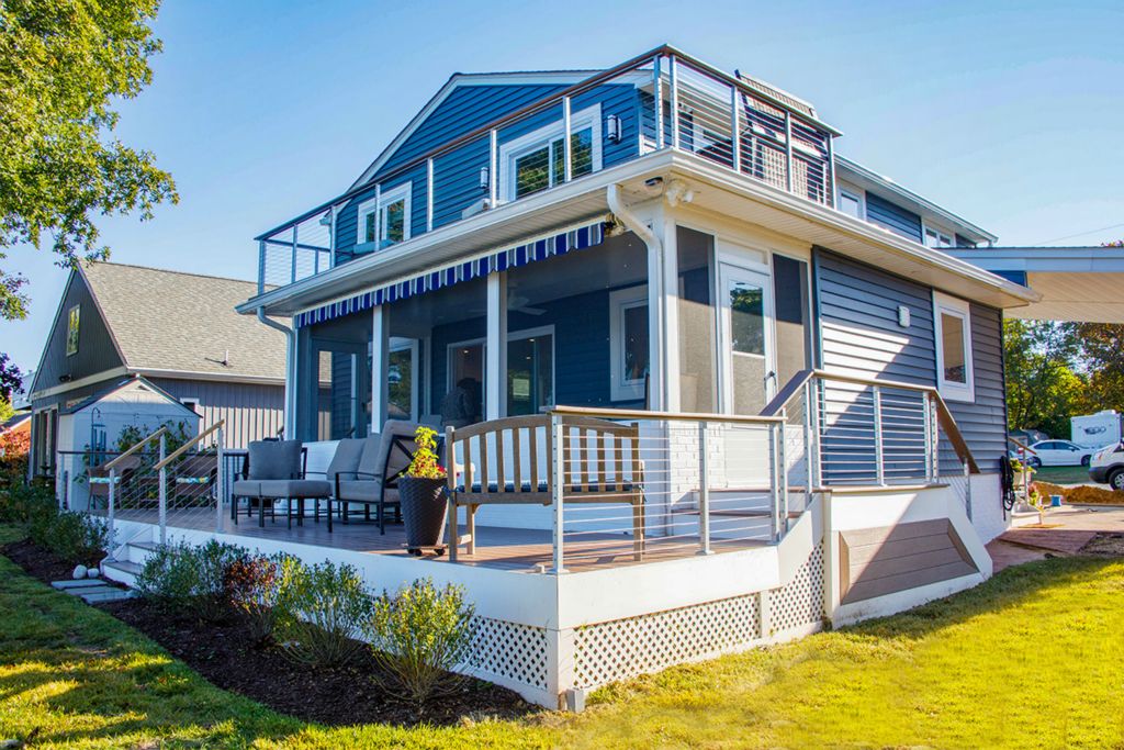 This whole-house remodel added a second floor balcony and rear deck.