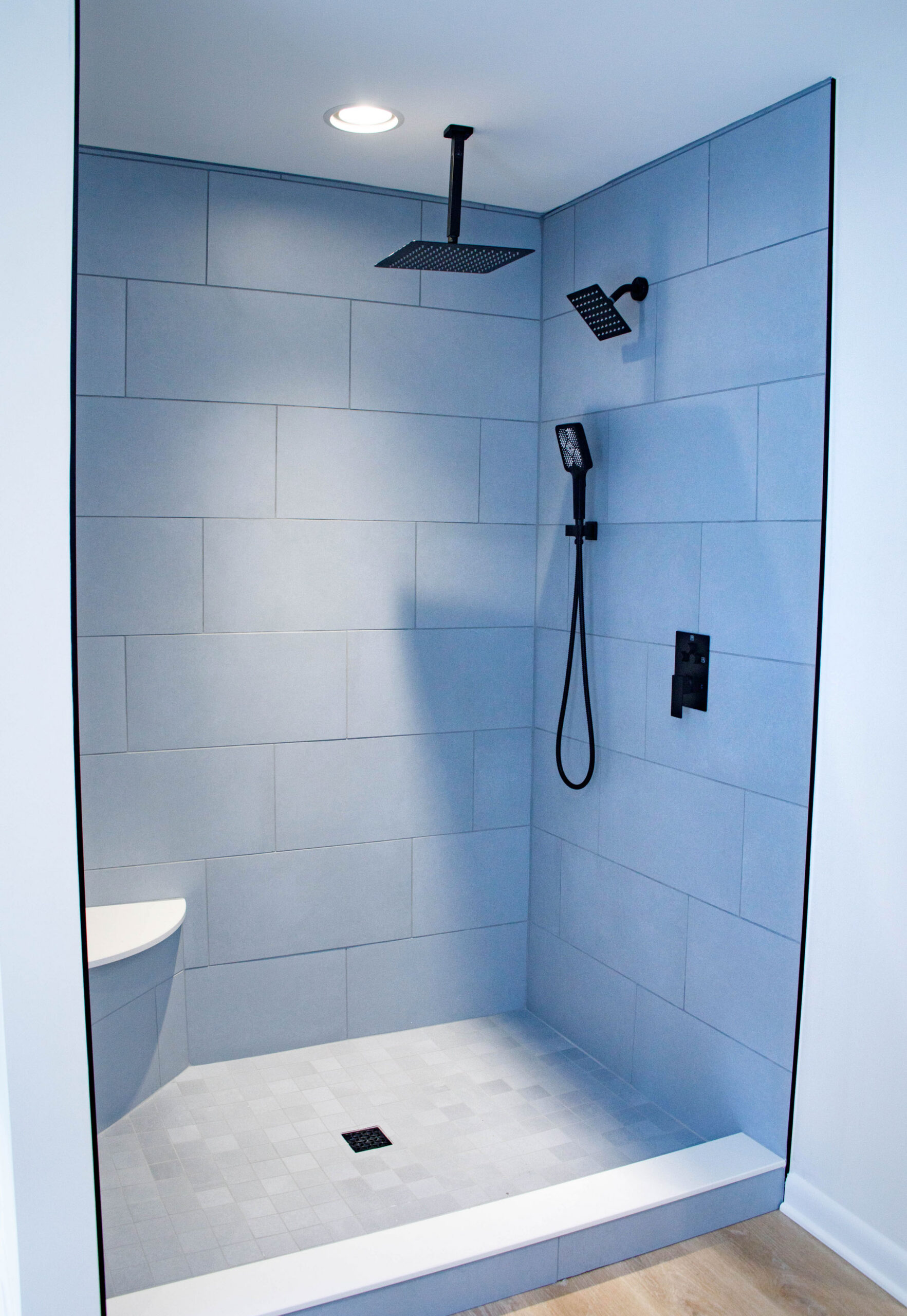 Custom tiled shower with dual showerheads