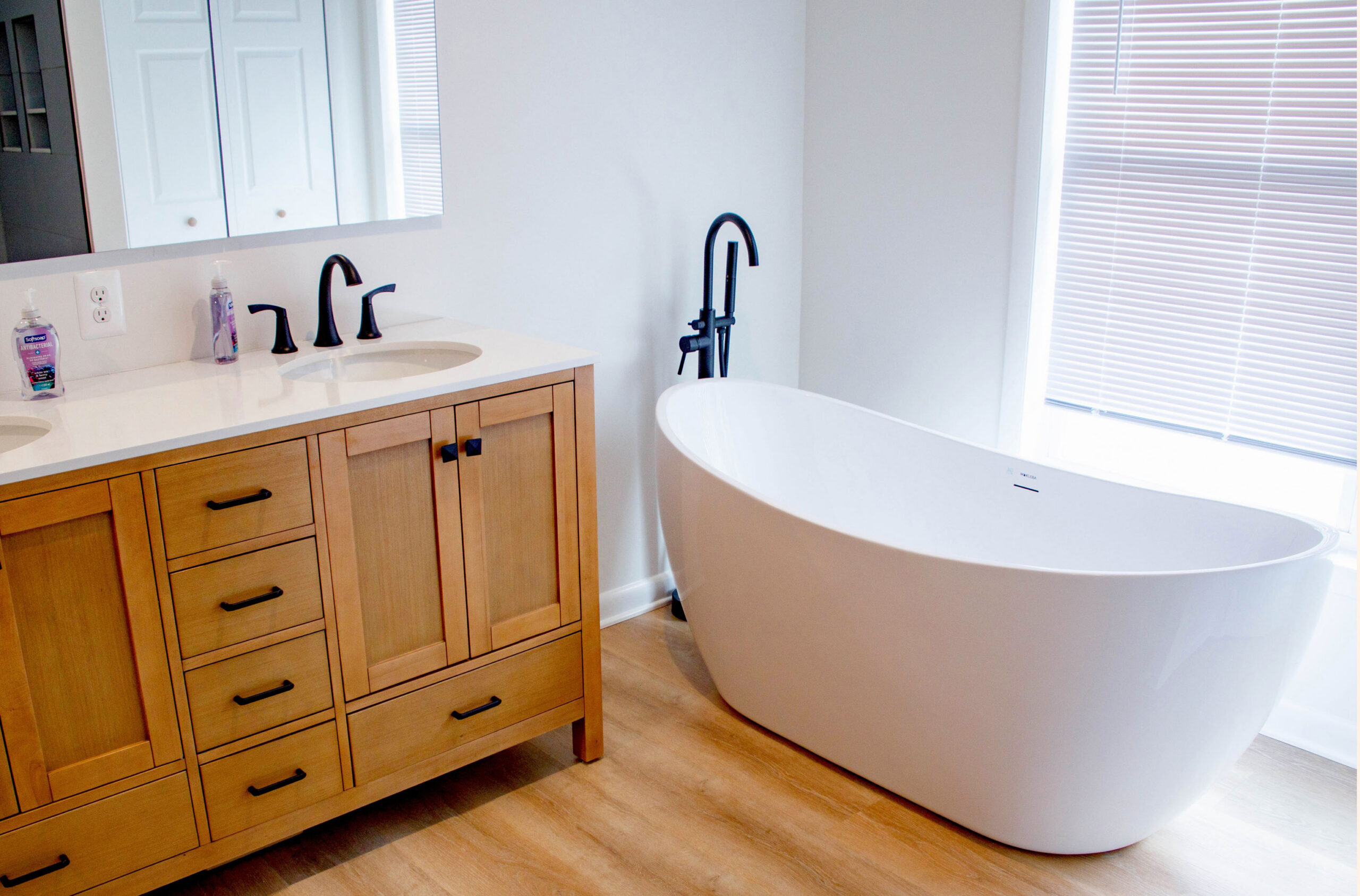 Freestanding soaking tub in master bathroom