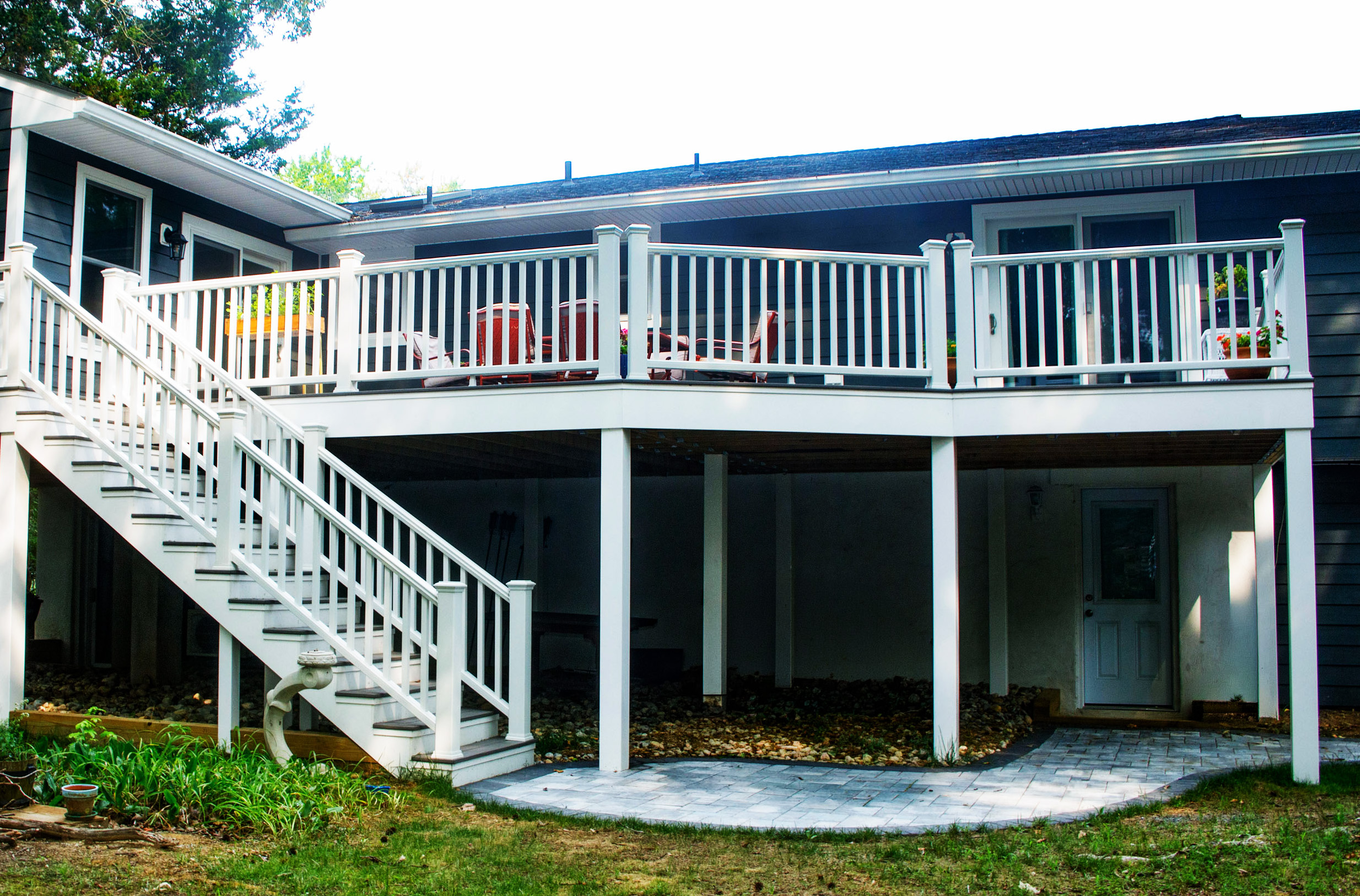 raised ranch back deck with paver path