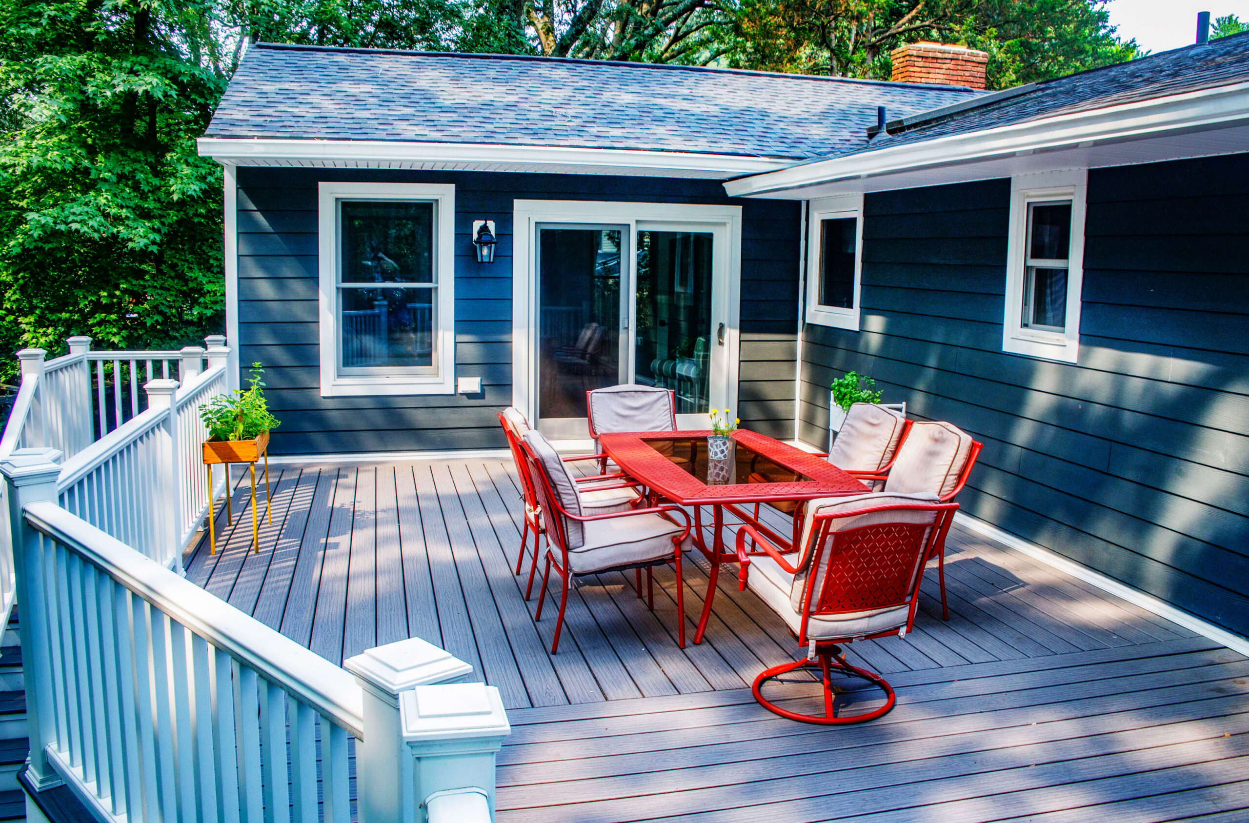raised ranch back deck addition with new sunroom